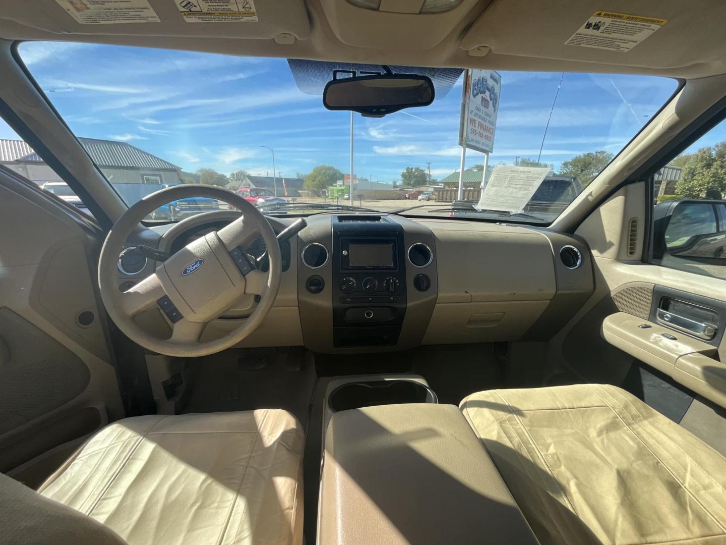 2004 Ford F-150 Lariat SuperCab 2WD (1FTRX12W54N) with an 4.6L V8 SOHC 16V engine, 4-Speed Automatic Overdrive transmission, located at 821 N. Prince Street, Clovis, NM, 88101, (575) 762-8852, 34.406643, -103.195999 - Photo#2